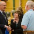 BC jobs minister Pat Bell speaks to carpentry program reps as Camosun president Kathryn Laurin looks on (photo Allan Shook).