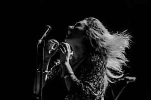 No Sinner vocalist Colleen Rennison doing what she does best (photo by Amy Ray).