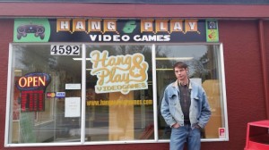 Adrian McBurney in front of his game shop, Hang & Play (photo provided).