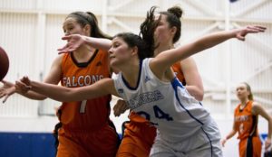 Rachael Bakker of the Camosun Chargers women’s basketball team hard at work during a game last season (photo by Kevin Light).