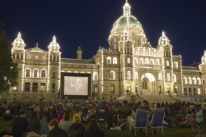 People enjoying last year’s Victoria Free B-Film Festival at the BC Legislature buildings lawn location (photo provided).